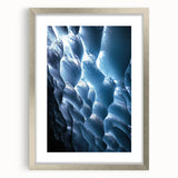 Framed silver landscape artwork depicting a serene cave scene, featuring natural hues and textures, perfect for enhancing modern home decor.