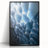 Framed acrylic artwork showcasing a stunning landscape of caves with intricate details, presented in a sleek black frame, perfect for modern home decor.