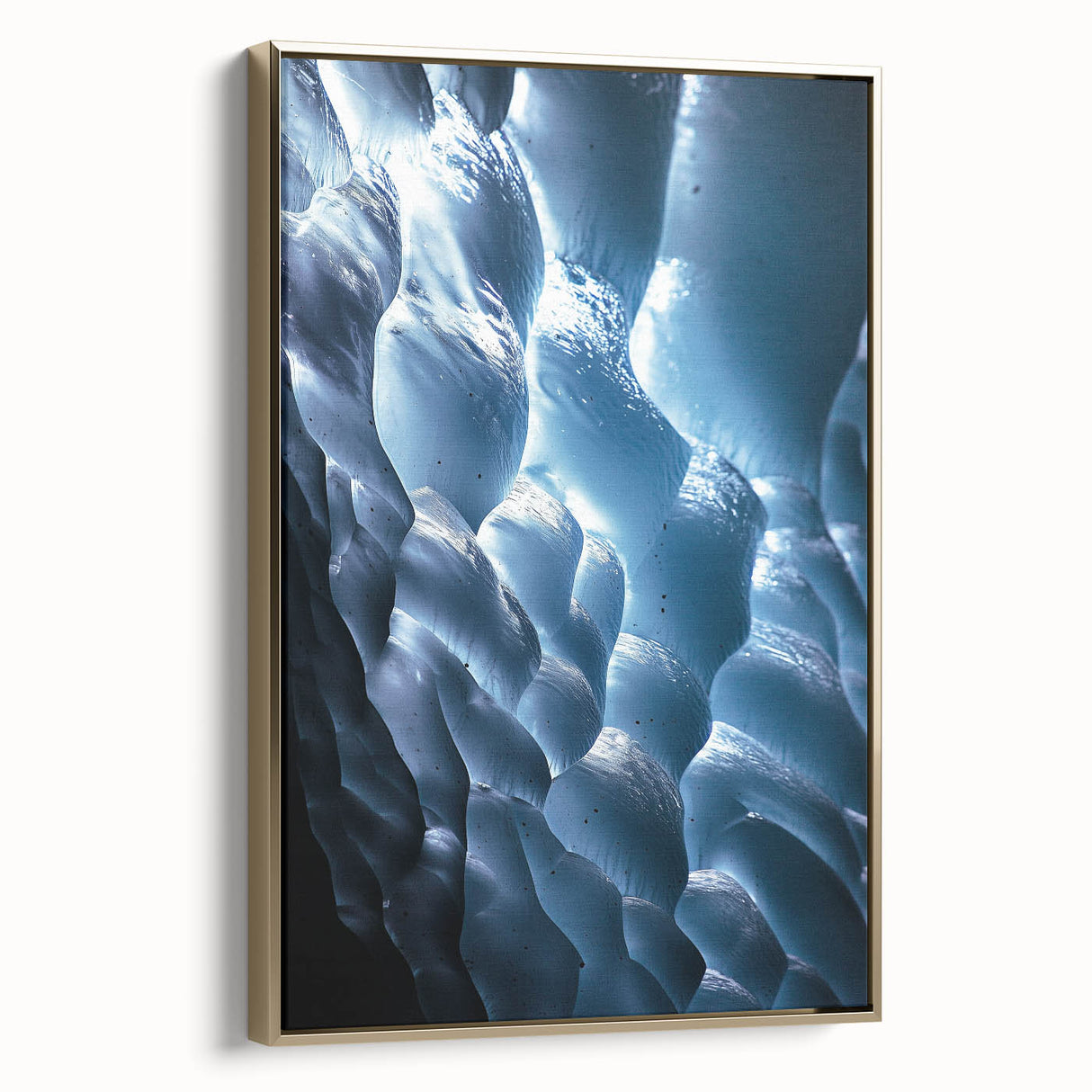Framed canvas artwork showcasing a stunning landscape with intricate cave formations, highlighted by a gold frame, perfect for home decor and artistic ambiance.