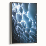 Framed canvas artwork depicting an intricate landscape with caves, featuring a silver frame that enhances its contemporary aesthetic, perfect for modern home decor.