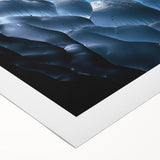 Rolled canvas artwork showcasing a vibrant landscape scene with intricate cave details, designed for stylish home decor, and securely packaged in a protective tube.