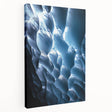 Stretched canvas artwork depicting a serene landscape with intricate cave formations, showcasing earthy tones and textures, perfect for home decor.