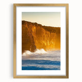 Elegant gold-framed landscape artwork showcasing dramatic cliffs under a clear blue sky, perfect for enhancing home decor with a touch of sophistication.