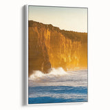 Framed canvas artwork depicting a stunning landscape of cliffs in soft earthy tones, showcasing natural beauty with a white frame that enhances its elegance. Perfect for home decor, this piece adds a serene touch to any living space.