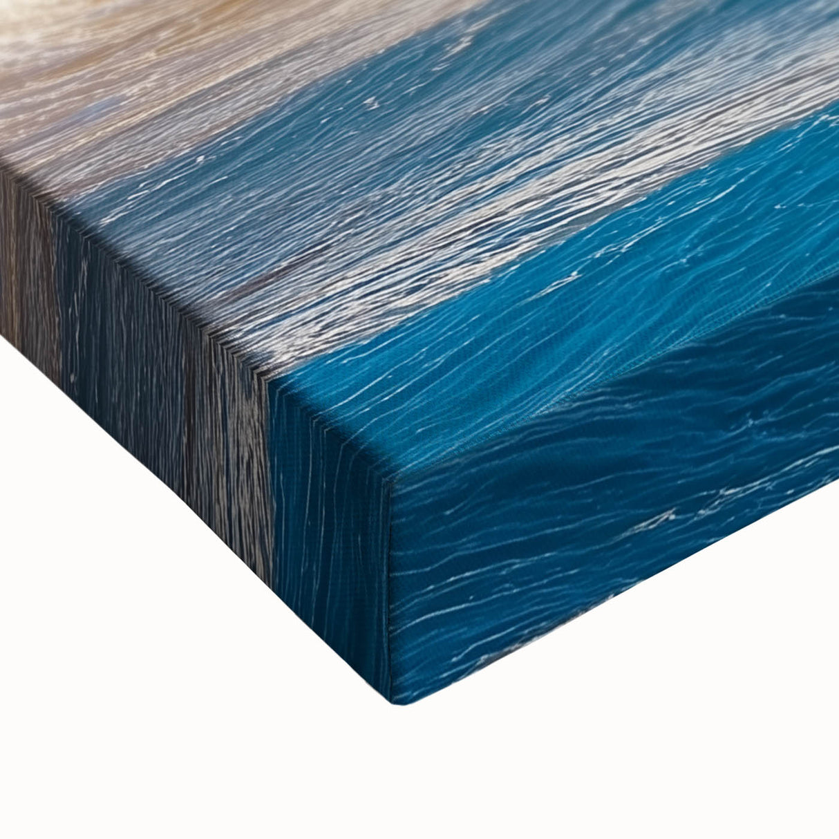 Close-up of a stretched canvas artwork depicting a dramatic landscape with steep cliffs and vibrant colors, perfect for enhancing home decor and creating a serene atmosphere.