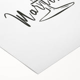 Art deco poster featuring a stylized cocktail glass in bold black and gold tones on a rolled canvas.