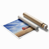 Rustic landscape barn rolled print showcasing a serene countryside scene with vibrant colors, wrapped securely in a protective tube for shipping. This artwork adds a charming farmhouse touch to home decor.