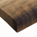 Close-up of a stretched canvas depicting a vibrant landscape of a rustic barn surrounded by lush greenery, showcasing rich colors and detailed textures, ideal for farmhouse decor.