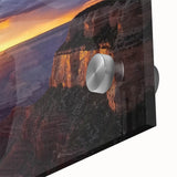 Close-up of a vibrant acrylic glass artwork showcasing dramatic canyons with rich colors and intricate details, perfect for modern home decor or art enthusiasts.