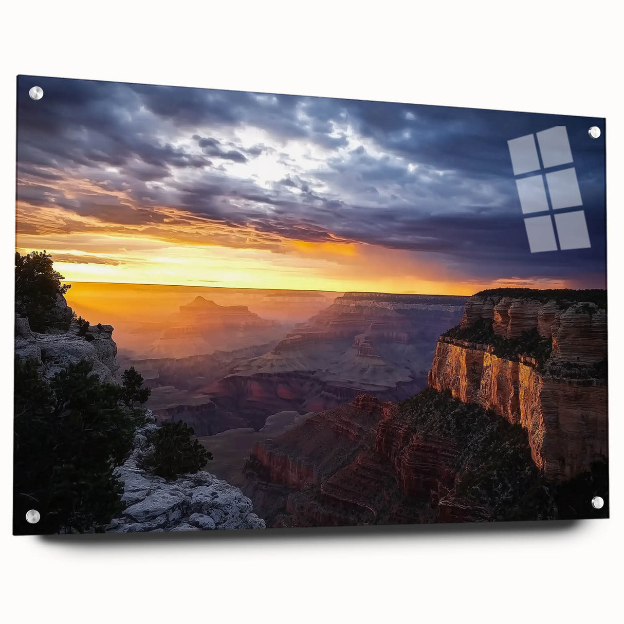 Acrylic landscape wall art depicting canyons, showcasing vibrant colors and intricate details, displayed in a side view with decorative pins for hanging.