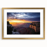 Elegant landscape art print showcasing canyons framed in gold with a white mat, perfect for home décor. Ideal for adding a touch of nature to any room's aesthetic.