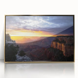 Framed acrylic wall art featuring a stunning landscape of canyons with rich gold accents, perfect for modern home decor and adding elegance to living spaces.