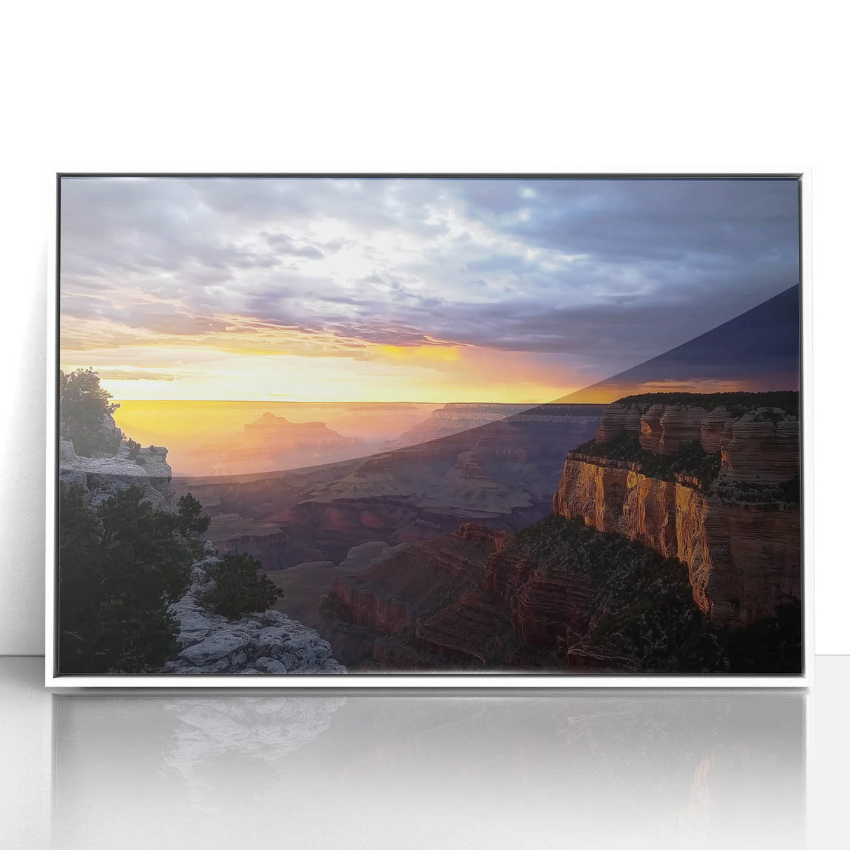Framed acrylic landscape artwork depicting vibrant canyons in warm hues, elegantly showcased with a white frame, perfect for enhancing modern home decor.