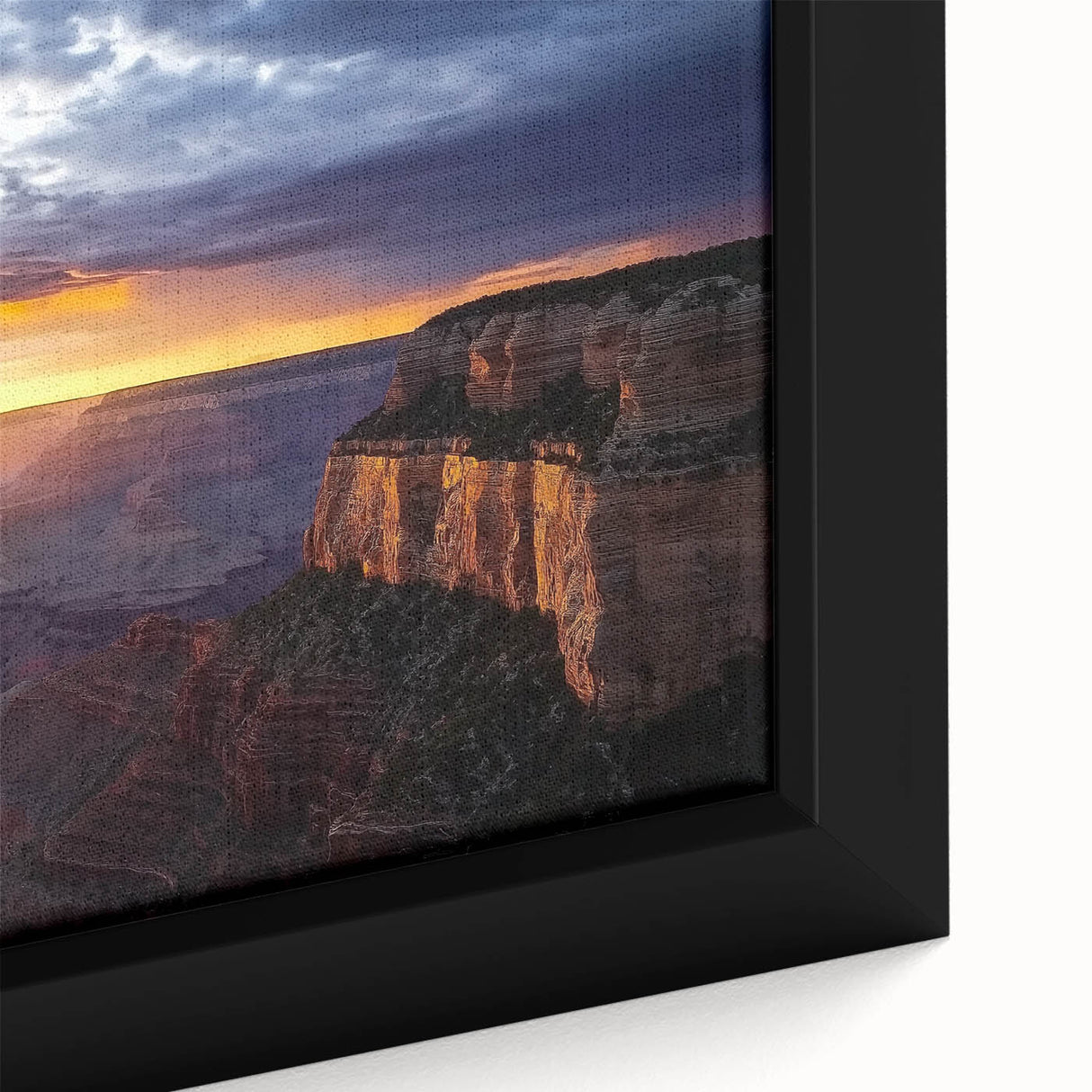 Close-up of a framed canvas artwork showcasing a vibrant landscape of canyons with rich earthy tones, highlighting intricate textures and natural beauty, perfect for home decor.