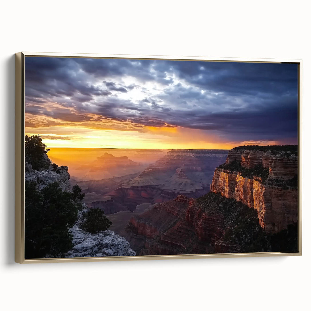 Framed canvas artwork showcasing a stunning landscape of canyons, featuring rich gold accents and a side view perspective, perfect for home decor.