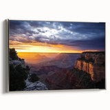 Framed canvas artwork showcasing a stunning landscape of canyons, with silver accents on the frame, perfect for enhancing modern home decor. Ideal for art lovers seeking nature-inspired wall art.
