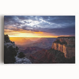 Vibrant stretch canvas artwork depicting majestic canyons at sunset, showcasing rich colors and intricate textures, perfect for enhancing home decor and wall aesthetics.