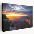 Stretched canvas artwork depicting a breathtaking landscape of canyons, showcasing rich earthy tones and intricate details, ideal for enhancing home decor.