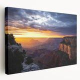 Stretched canvas artwork depicting a breathtaking landscape of canyons, showcasing rich earthy tones and intricate details, ideal for enhancing home decor.