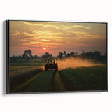 Framed canvas artwork depicting a serene countryside landscape with lush green fields and a blue sky, showcasing a black frame that enhances its elegance.