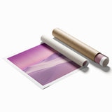 Desert landscape rolled canvas print showcasing vibrant hues of orange and beige, depicting a serene sunset over dunes, packaged securely in a protective tube.