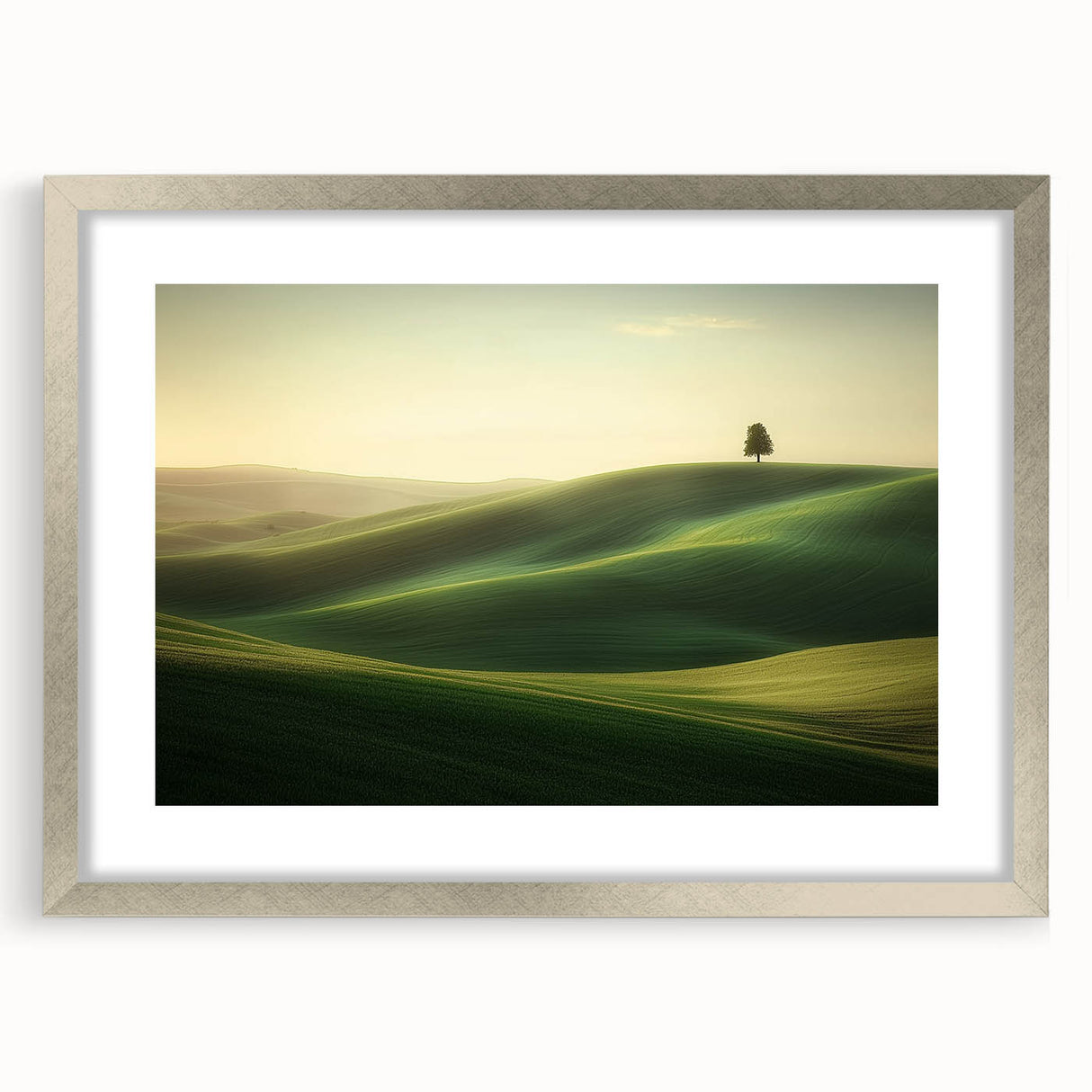 Silver-framed landscape artwork featuring vibrant green fields and a serene blue sky, elegantly matted for a polished look, ideal for home decor.