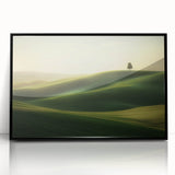 Framed acrylic landscape artwork showcasing vibrant green fields under a bright blue sky, with a sleek black frame enhancing the visual appeal. Ideal for modern home decor.