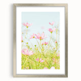 Textured abstract art print in soft green and white hues, framed in silver, suitable for bedroom decor.