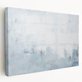 Abstract wall art featuring vibrant strokes in shades of blue, orange, and yellow on a stretched canvas, showcasing a modern design ideal for home decor.