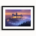 Elegant black-framed landscape artwork showcasing a majestic castle surrounded by lush greenery, designed to enhance home decor with a sophisticated touch.