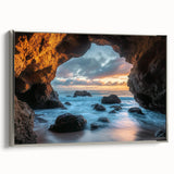 Framed canvas artwork showcasing a stunning landscape scene featuring caves, presented in a sleek silver frame, ideal for modern home decor.