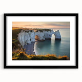 Framed landscape artwork showcasing dramatic cliffs in a black mat, designed for modern home decor, emphasizing natural beauty and elegance.