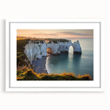 Elegant white-framed landscape artwork showcasing dramatic cliffs and serene skies, perfect for modern decor and enhancing interior spaces with natural beauty.