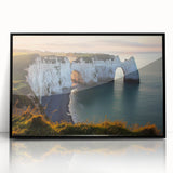 Framed acrylic artwork depicting dramatic cliffs against a vibrant sky, showcasing intricate details and bold colors, perfect for modern home decor.