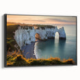 Framed canvas artwork depicting dramatic cliffs and landscapes, featuring a sleek black frame. Ideal for modern home decor or art enthusiasts, showcasing nature's beauty.