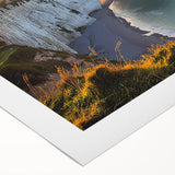 Stunning rolled canvas artwork depicting dramatic cliffs and vibrant landscapes, showcasing rich colors and intricate details, perfect for enhancing any home decor.