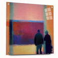 Abstract figurative wall art displayed in acrylic glass, showcasing vibrant colors and dynamic shapes, perfect for modern home decor. Side view highlights the elegant pins securing the artwork.