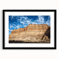 Black-framed landscape artwork depicting dramatic canyons with a mat border, enhancing the natural beauty and depth of the scene, perfect for home decor.
