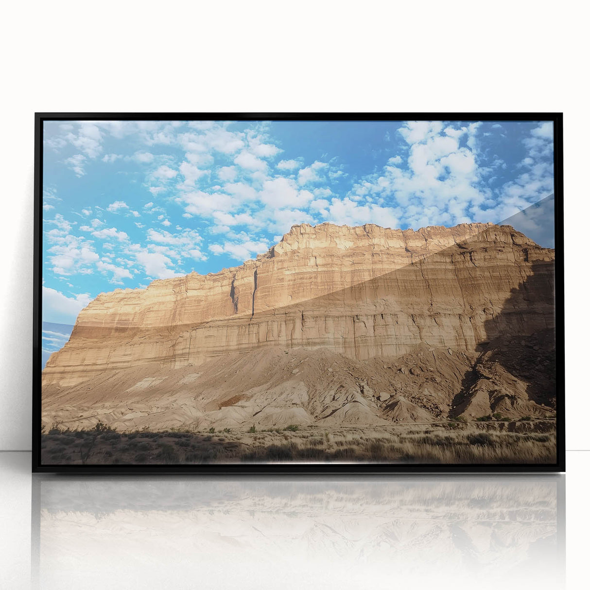 Framed acrylic artwork featuring a stunning landscape of canyons, highlighted by vibrant colors and intricate details, set against a sleek black frame, ideal for home decor.
