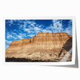 Stunning landscape print of vibrant canyons showcasing rich earthy tones and intricate details, rolled for easy shipping and display in your home decor.