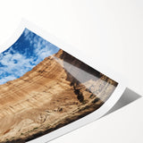 Vibrant landscape print showcasing majestic canyons in rich earth tones, elegantly rolled for display or framing, ideal for home decor enthusiasts.