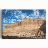 Stretched canvas artwork showcasing a vibrant landscape of canyons in warm earth tones, ideal for home decor, enhancing any living space with natural beauty.