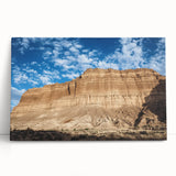 Stretched canvas artwork depicting a stunning landscape of canyons, showcasing vibrant colors and intricate details, perfect for home decor or office spaces.