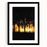 Black-framed landscape artwork featuring a serene countryside scene with vibrant greenery and a clear blue sky, ideal for home decor or office settings.