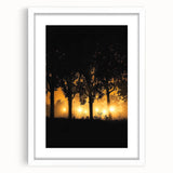 White-framed landscape artwork depicting a serene countryside scene, featuring vibrant greens and soft blues, perfect for enhancing home decor with a natural touch.