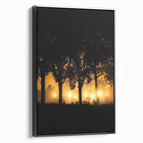 Framed canvas artwork depicting a serene countryside landscape with lush green fields and distant hills, elegantly showcased in a sleek black frame, ideal for home decor.