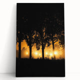 Stretched canvas artwork depicting a serene countryside landscape with rolling hills and vibrant green fields, elegantly leaning against a textured wall. Perfect for home decor.