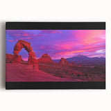 Desert landscape stretched canvas artwork showcasing vibrant orange and yellow hues of a sunset over sand dunes, framed for an elegant display. Perfect for home decor.