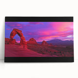 Desert landscape stretched canvas art featuring warm hues of orange and yellow, leaning against a rustic wall, adding a vibrant touch to home decor. Ideal for nature lovers and art enthusiasts seeking desert-themed artwork.