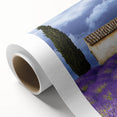 Vibrant rolled canvas depicting a serene landscape with lush green fields and a bright blue sky, packaged securely in a protective cardboard tube for easy transport.